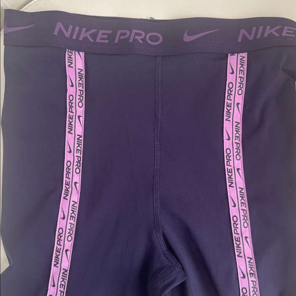 Nike Pants - NWT. Nike Pro Women’s Dri-Fit Training Leggings. Color: Purple. Size: S/M
